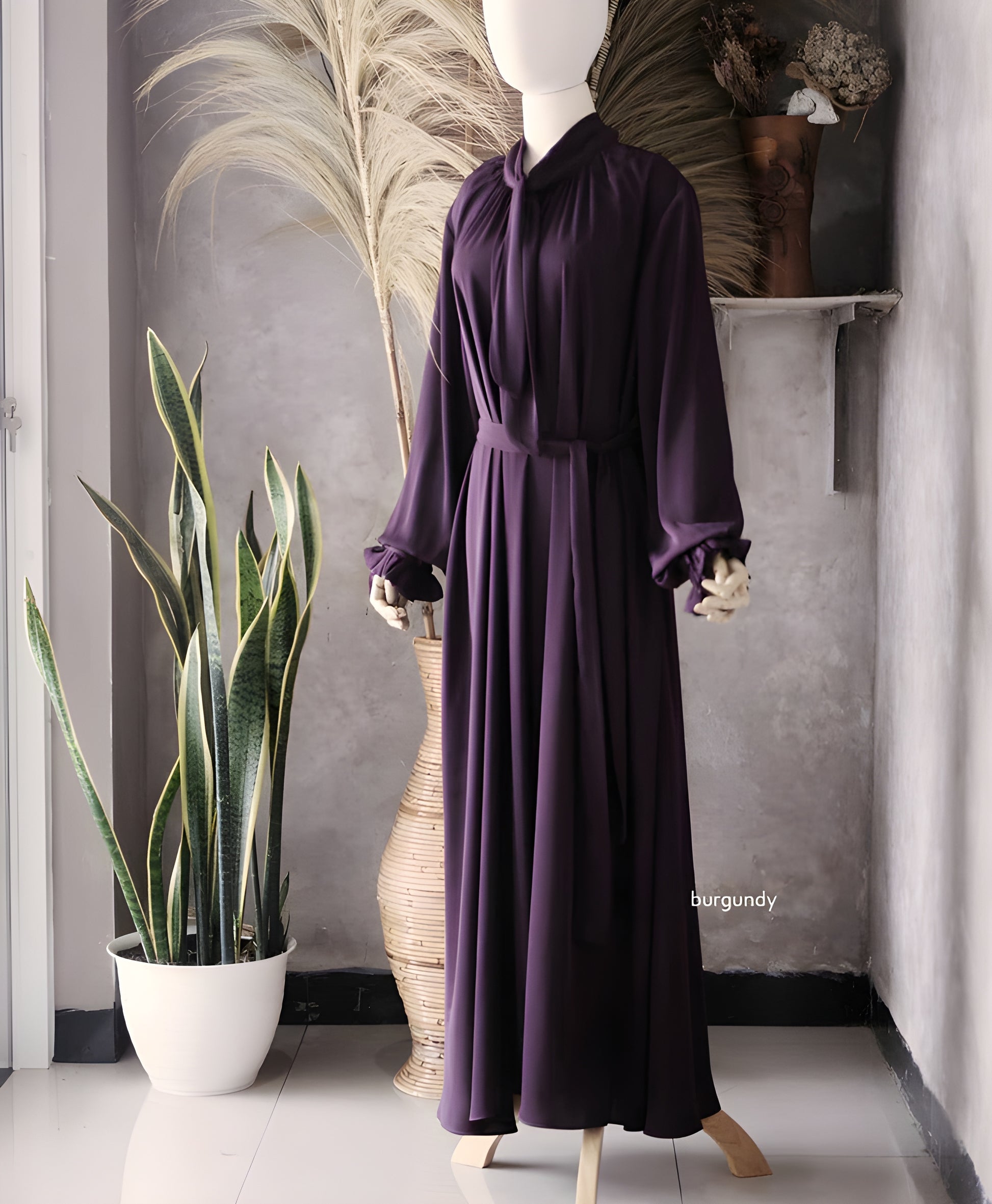 The detail of Abaya Nourah Series in Burgundy color.