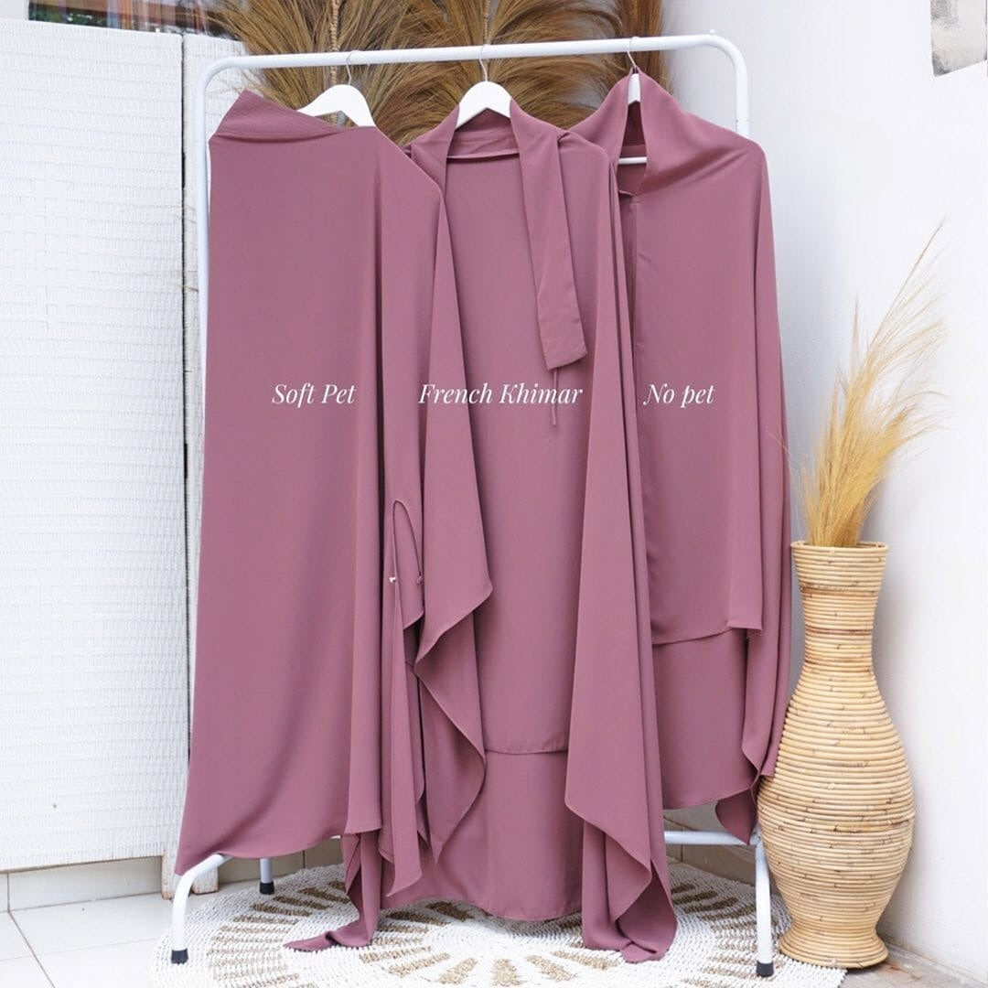 The difference between khimar styles of Soft Pad Khimar, French Khimar, and Basic Non Pad Khimar when hung with a hanger.